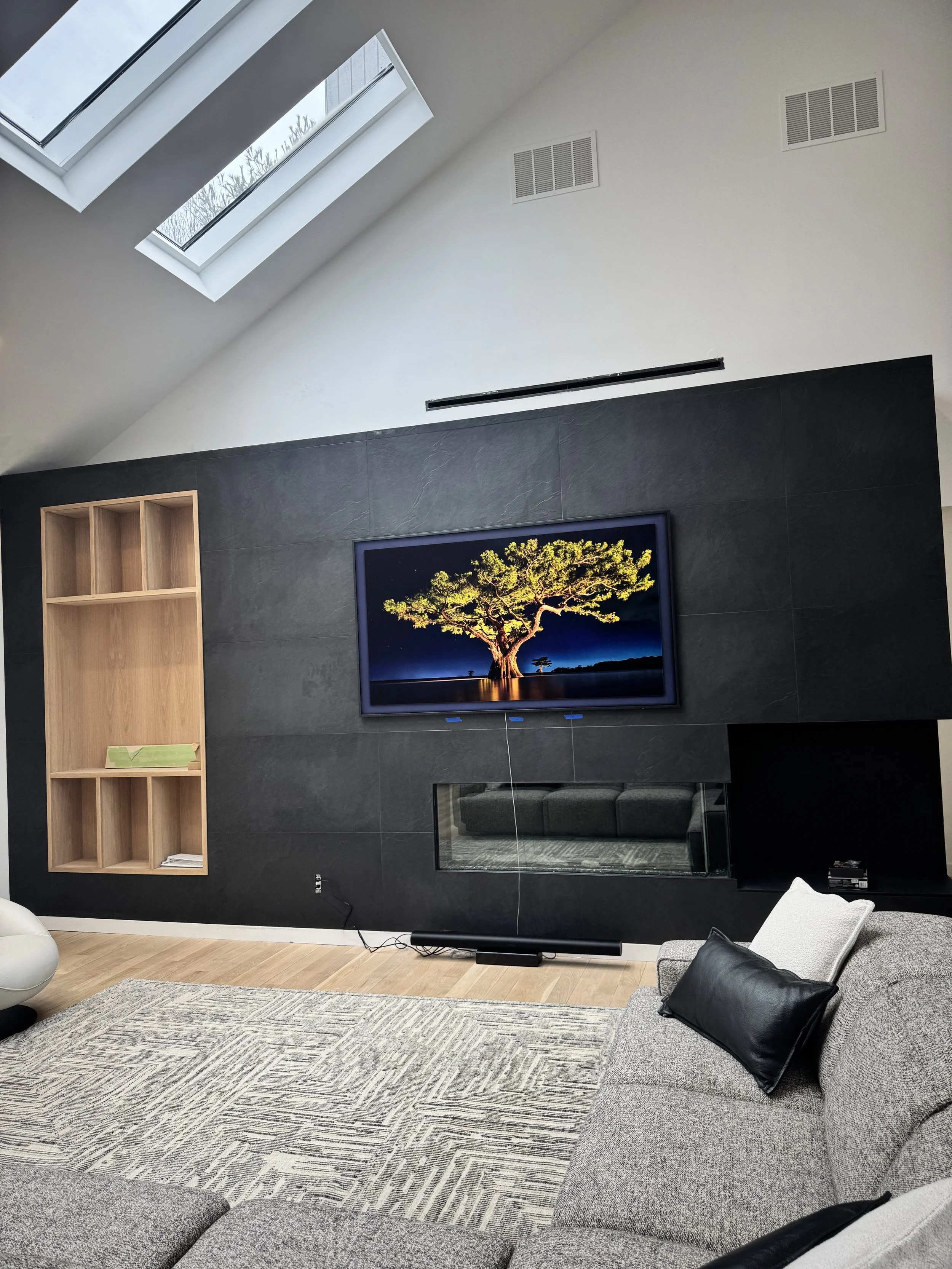 Modern living room with a wooden niche where a collector requested a bespoke textile artwork | Ana Salazar Atelier