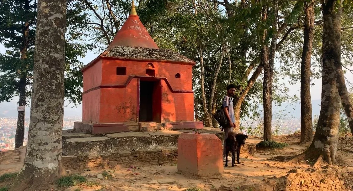 A Shiva shrine at the peak of a mountain.