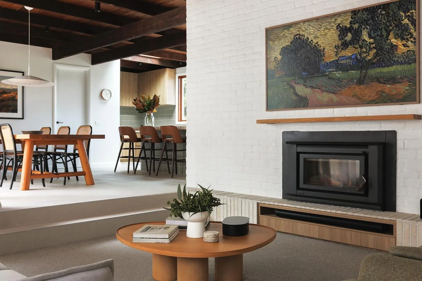 BEFORE + AFTER
The fireplace at our Willora project sets the tone for the whole room, so we designed the layout around it.

Custom joinery hides the AV gear, and with clever cable work by @south.east.electrical, the TV feels right at home.

We chose 