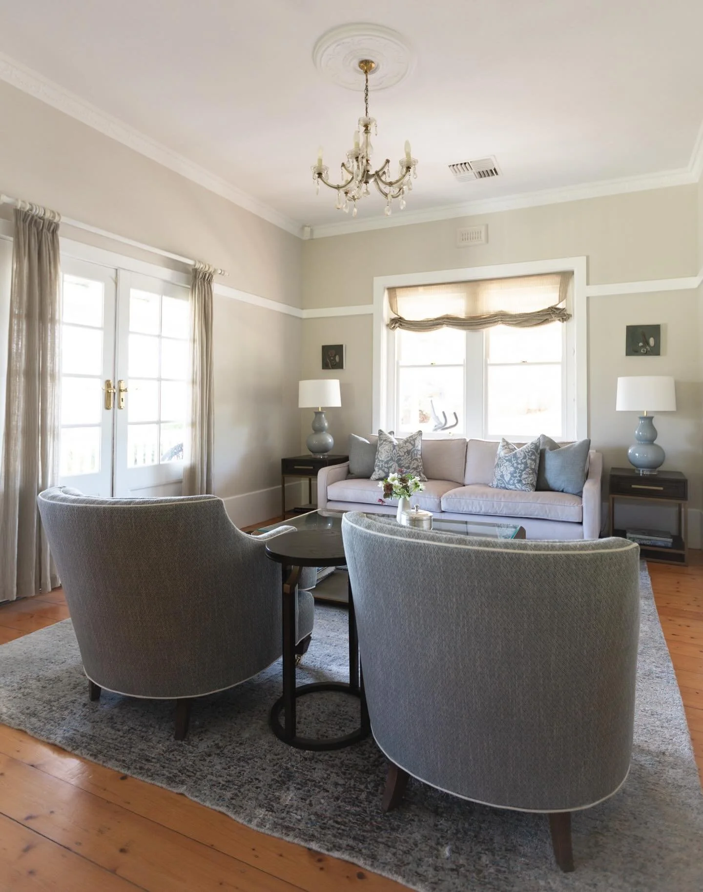 FURNITURE SOURCING / A timeless living room transformation for our Mt Eliza client. Working within a beautiful heritage home, we reimagined the layout to create a space that feels both elevated and effortless.

Soft neutral walls paired with crisp wh