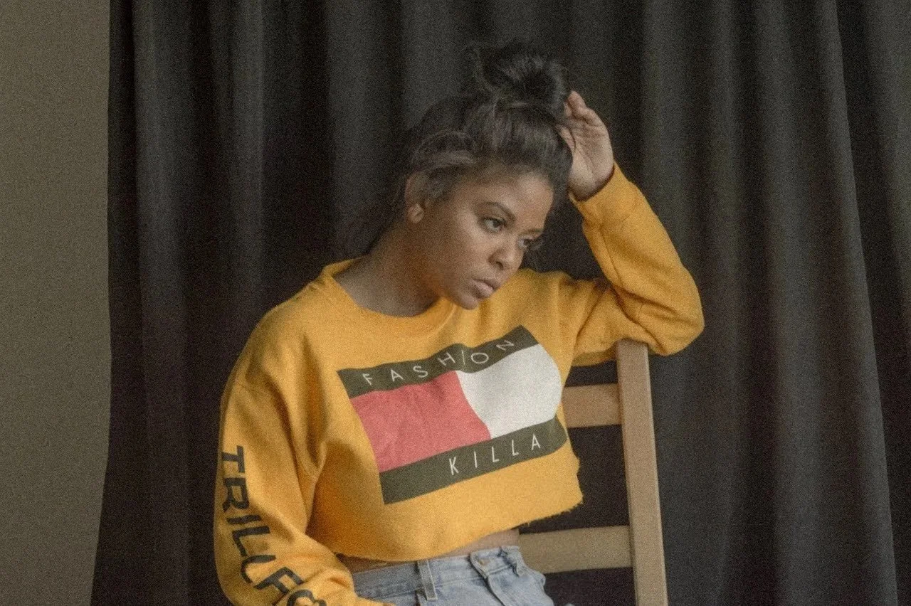 woman posing in yellow sweatshirt cinematic portrait photography Los Angeles