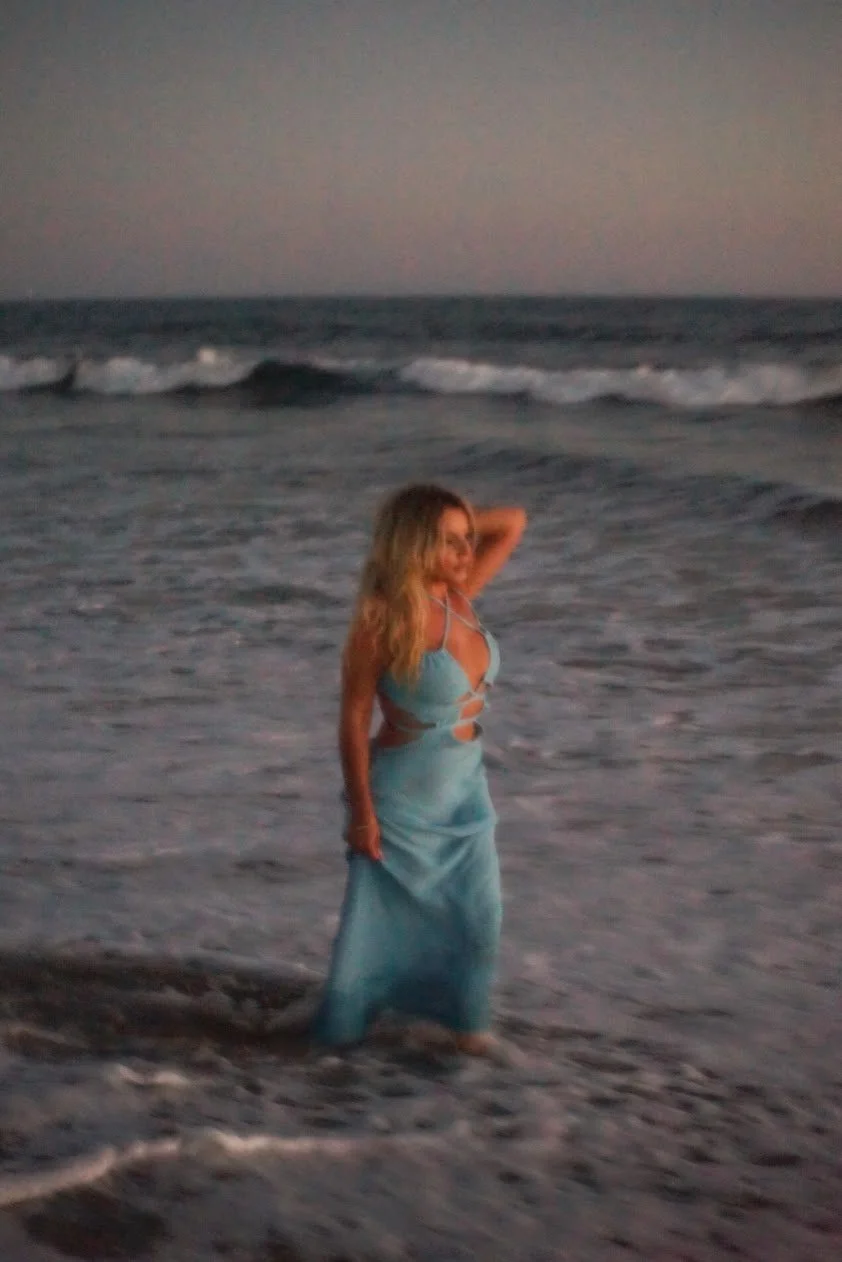 woman by ocean waves during sunset natural light photography Los Angeles