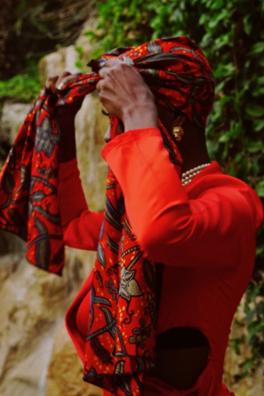 woman adjusting headwrap fashion editorial photography Los Angeles