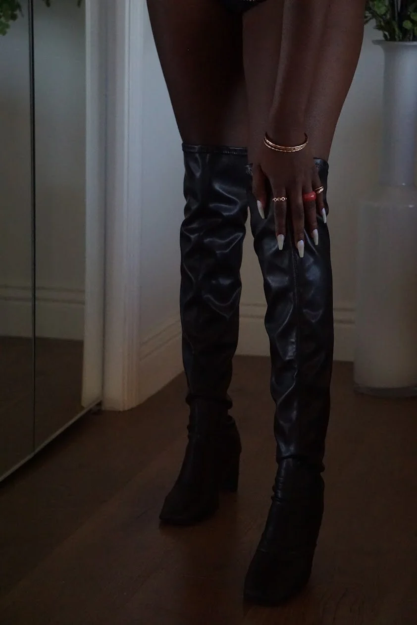 woman wearing black boots indoor moody cinematic portrait photography Los Angeles