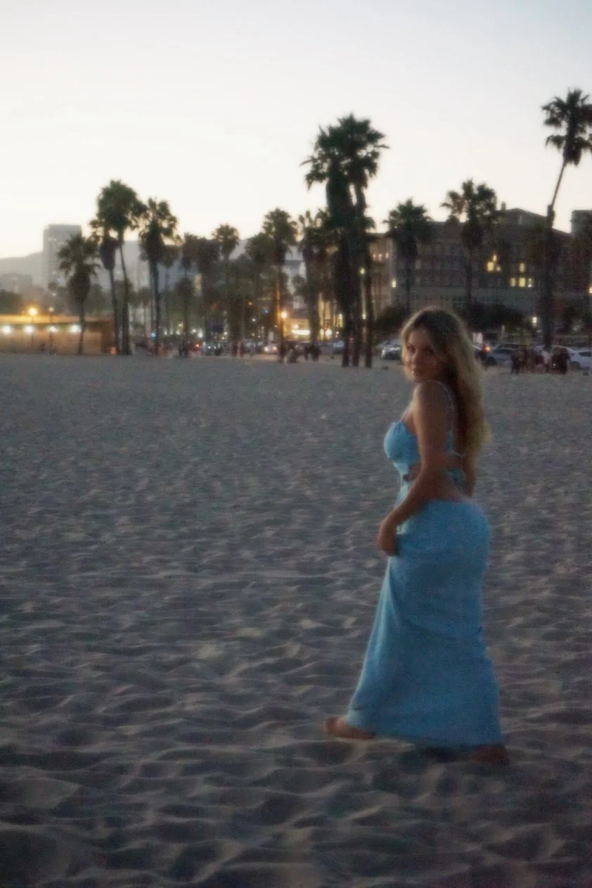 woman in blue dress by ocean sunset portrait photography Los Angeles