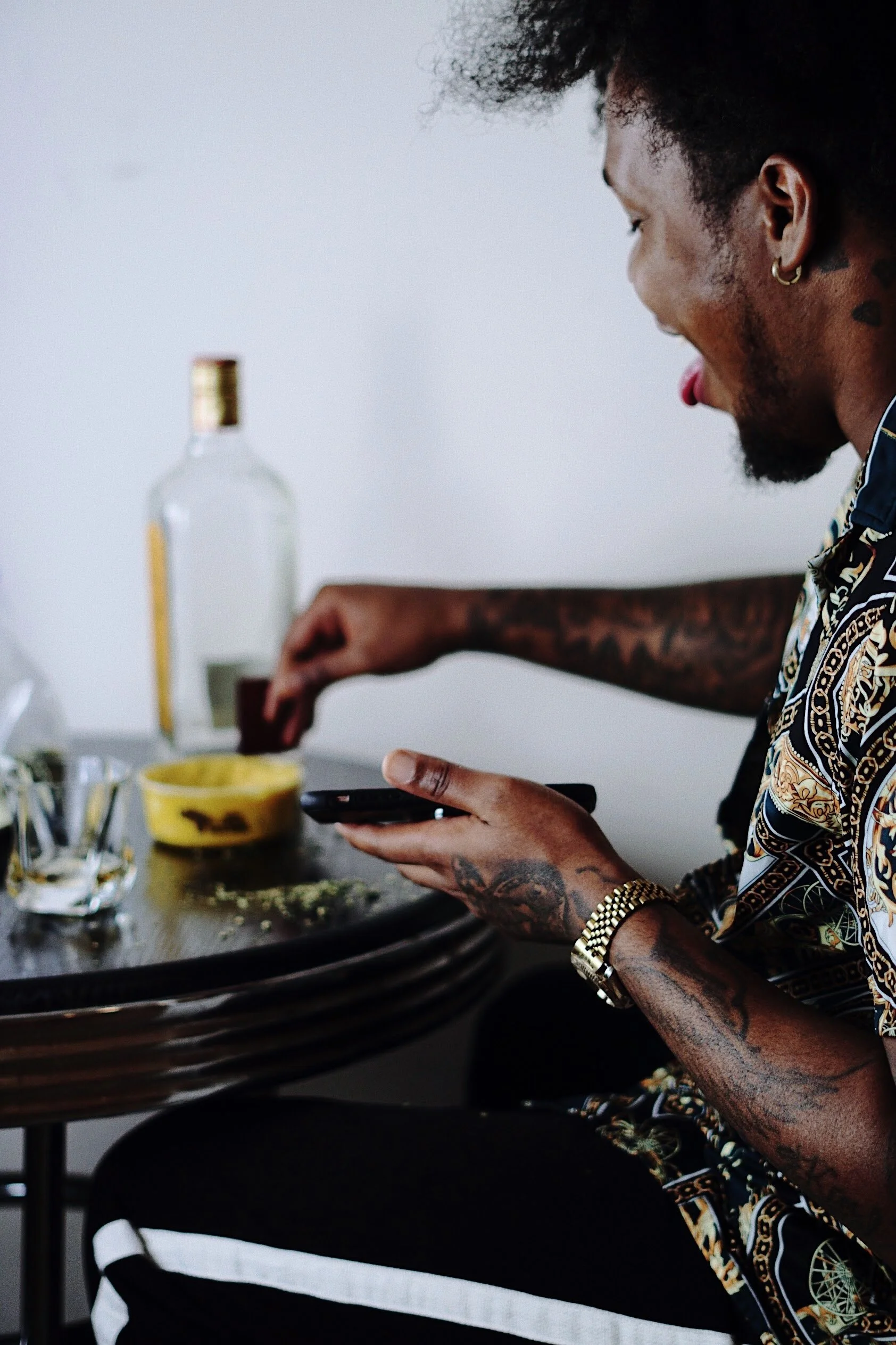man at table preparing cannabis cinematic lifestyle photography Los Angeles