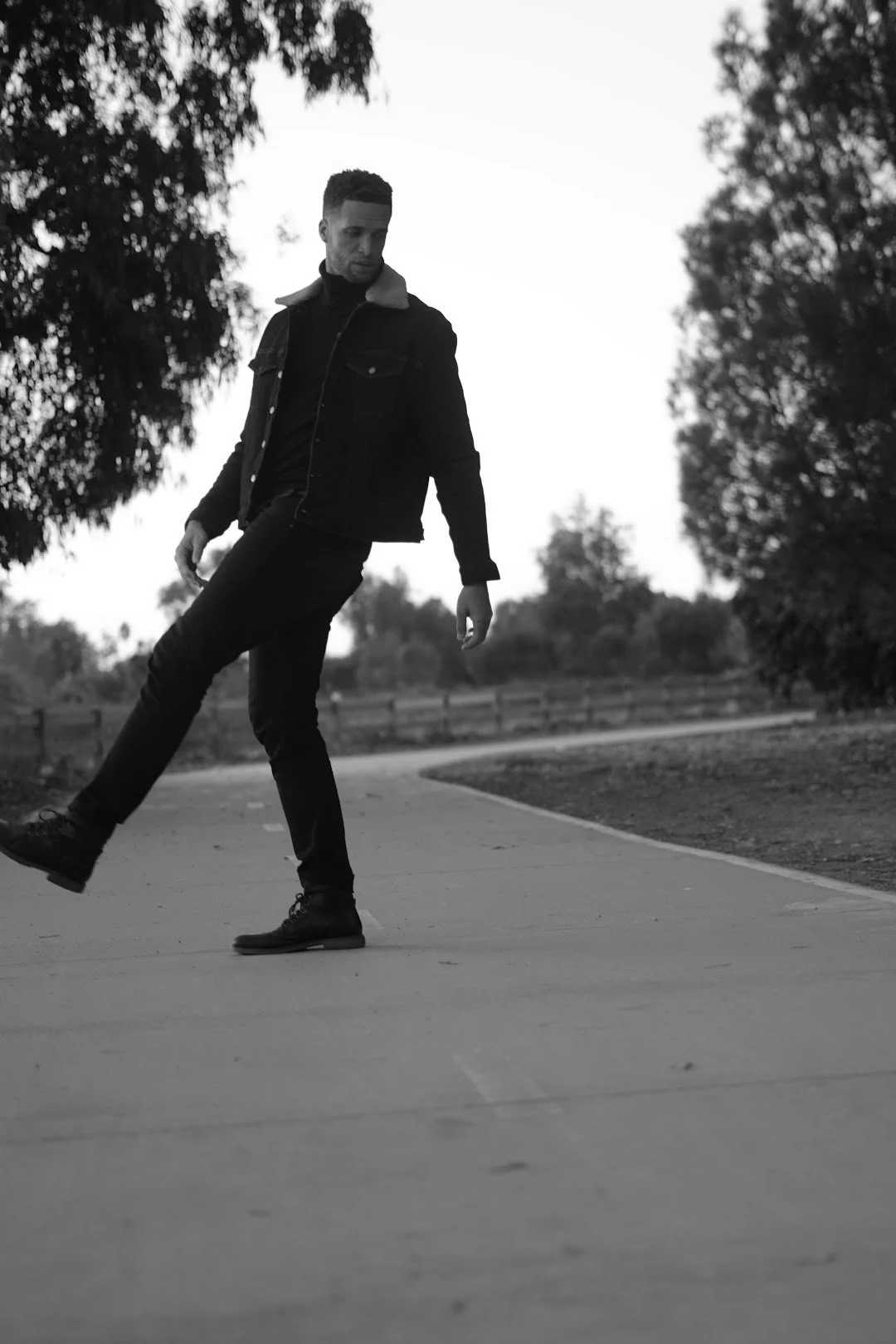man walking on path black and white street style photography Los Angeles