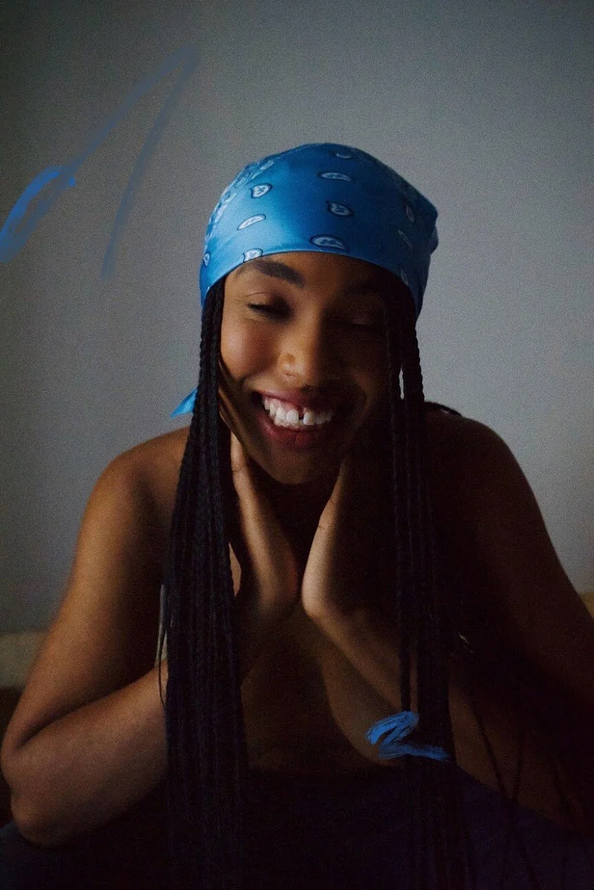 woman smiling wearing blue bandana cinematic portrait photography Los Angeles