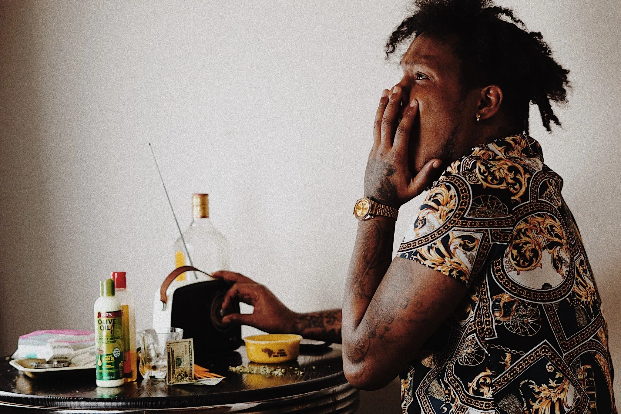 man sitting at table hype candid portrait photography Los Angeles