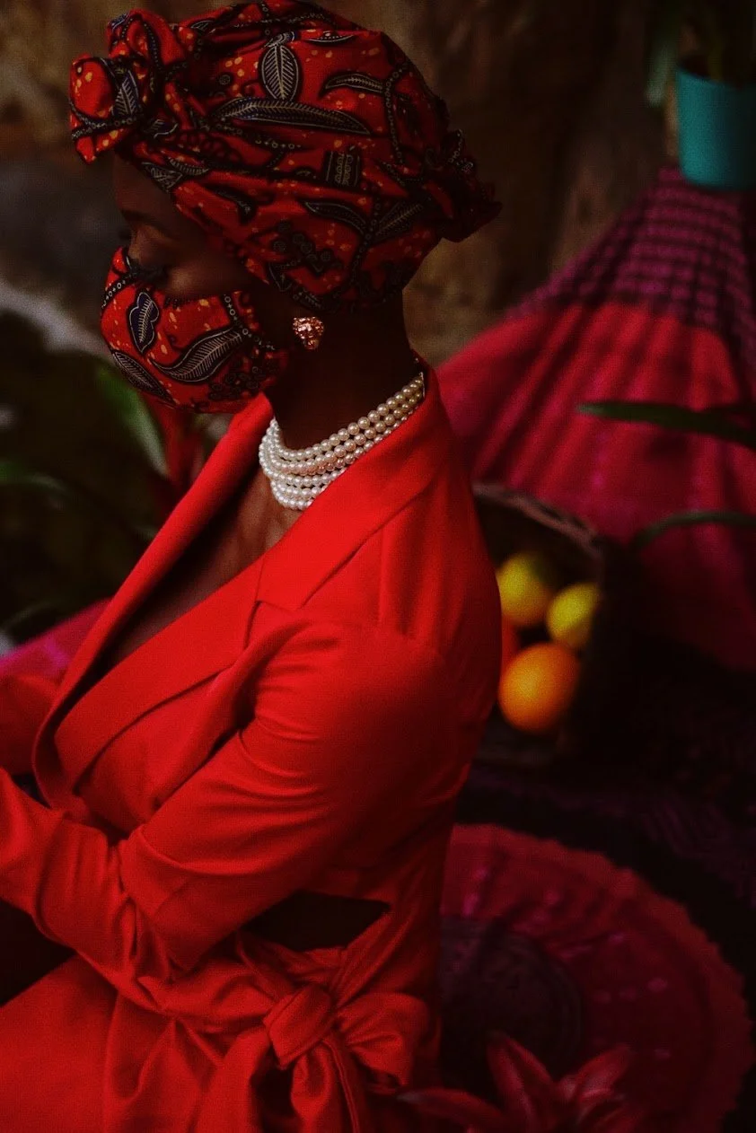 woman in red styling with headwrap and jewelry cinematic portrait photography Los Angeles