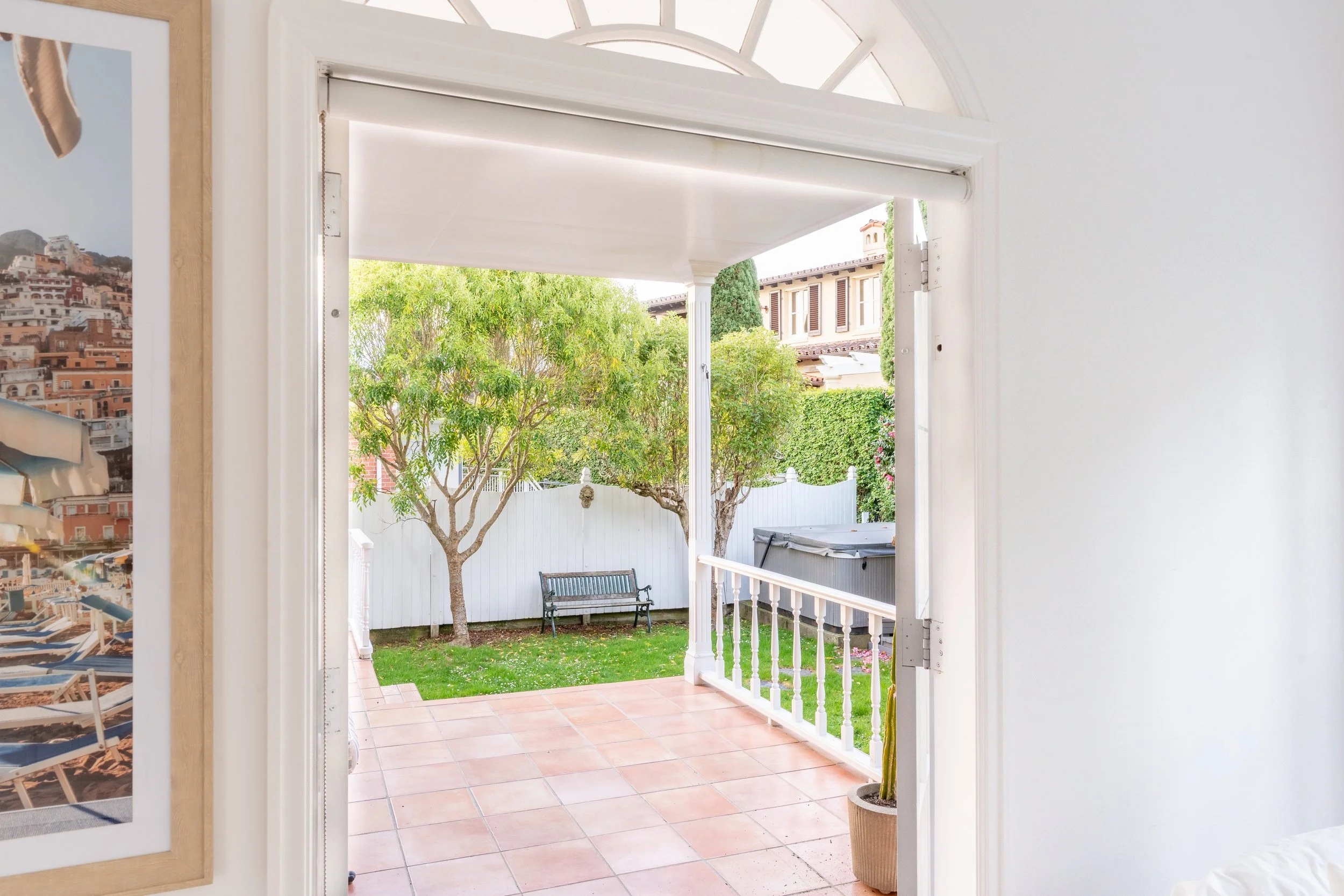 Downstairs patio with access to the garden and spa pool