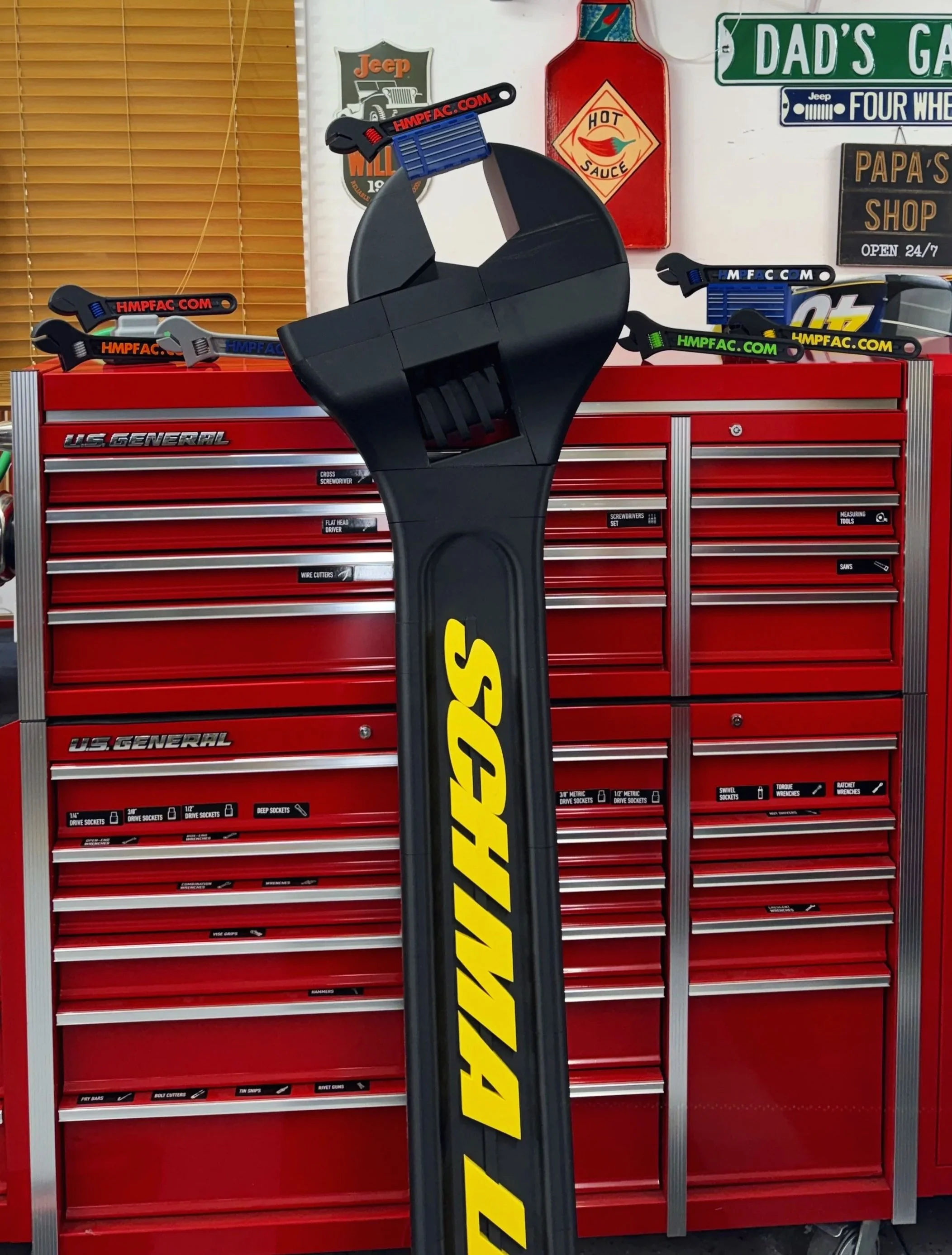 Big Ass Adjustable Wrench standing in garage