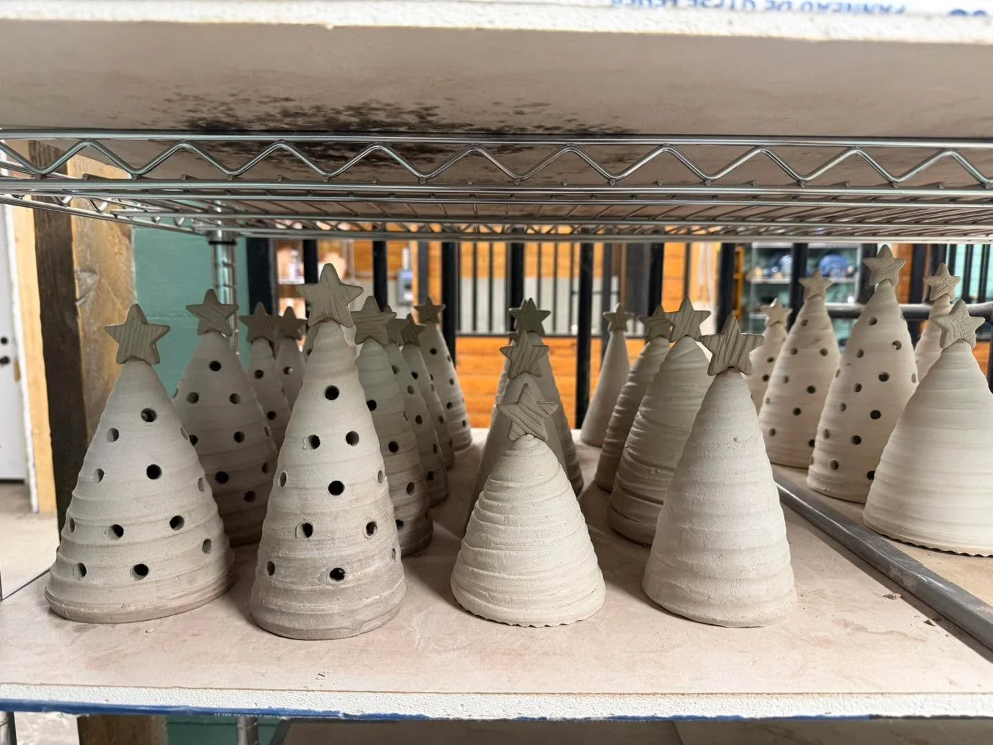 Last night the trees got stars.  Tomorrow they get bisque fired, and they’ll be raku fired on Saturday! 
#christmasdecor #christmas2025 #redbarnpotteryco