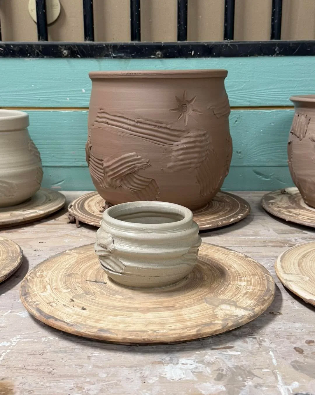 Some work from the past couple days.  I decided to keep cleaning the studio by tackling a pile of reclaimed and turning it into flower pots.  #pottery #potterystudio #potteryofinstagram #potterylife #redbarnpotteryco #springiscoming