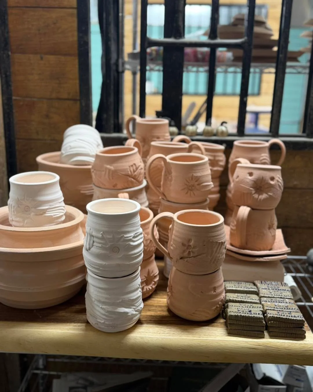 The bisqueware is piling up! 
#pottery #potterystudio #potterylife #redbarnpotteryco