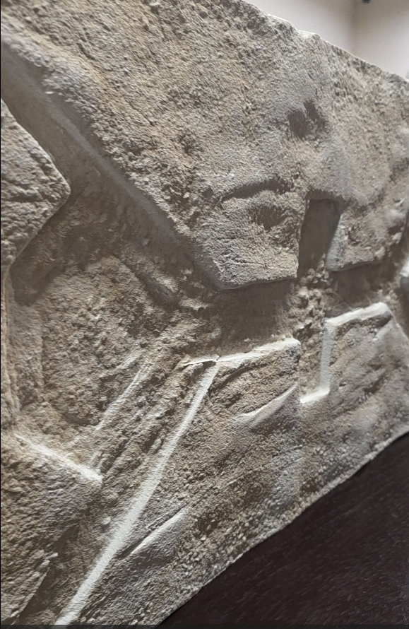 T-PILLAR furniture in production process, showcasing hand-carved sacred symbols and artisanal craftsmanship.