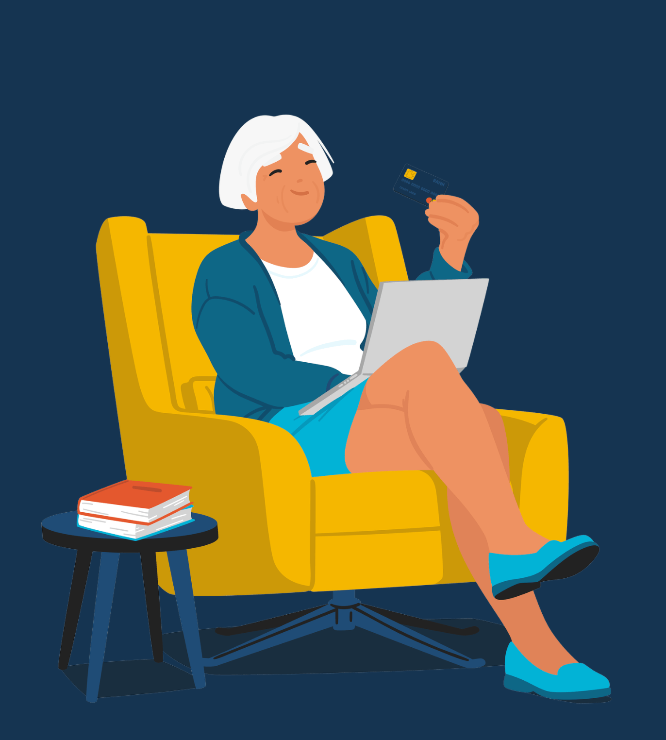 An older woman with white hair sitting in a yellow armchair, smiling and holding a credit card in one hand, with a laptop on her lap.