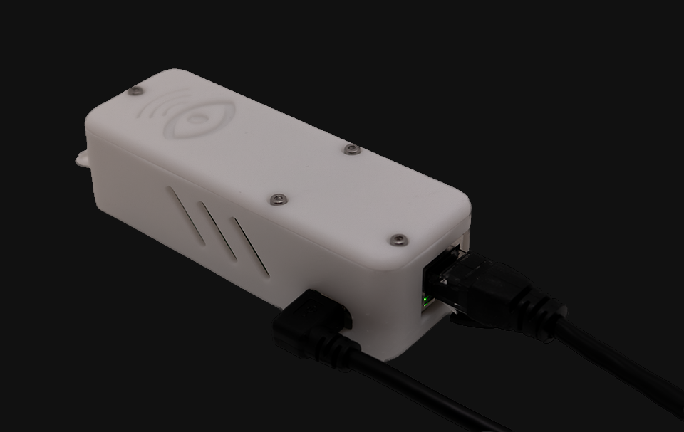A white device with cables coming out of it