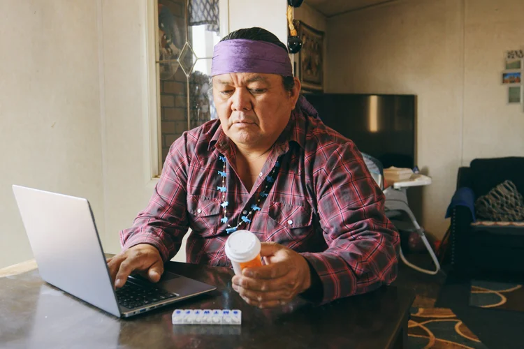 DIHFS - Man on Computer with Medication