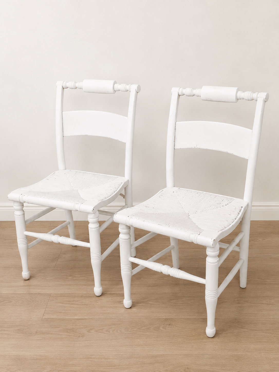 White Cane Chairs - $140/pair / Width: 16" / Depth: 15" / Height: 33" 