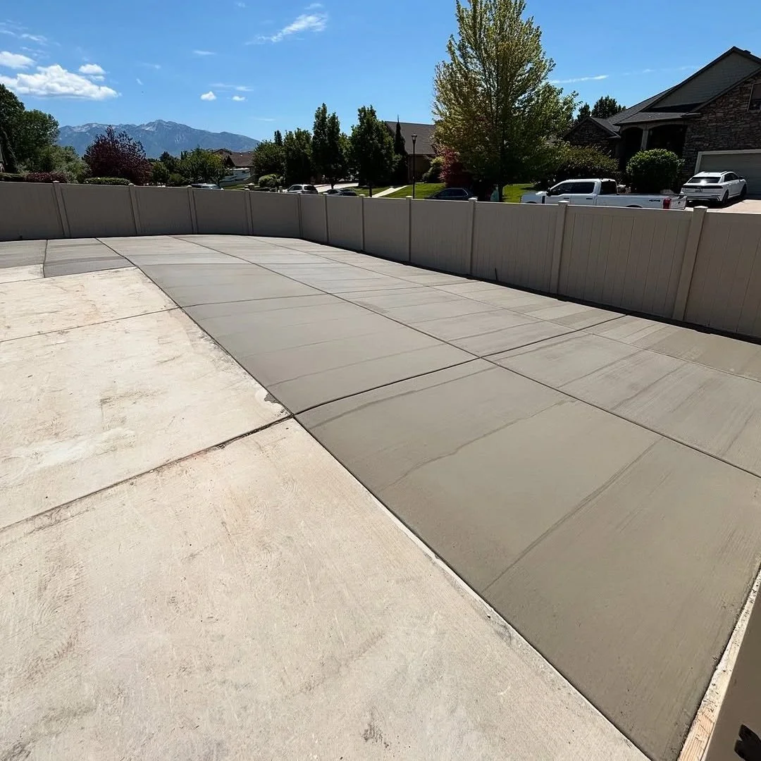 After | Tree and Weed Removal and Concrete Driveway Installation near Salt Lake City, UT by M&M Concrete Construction.
