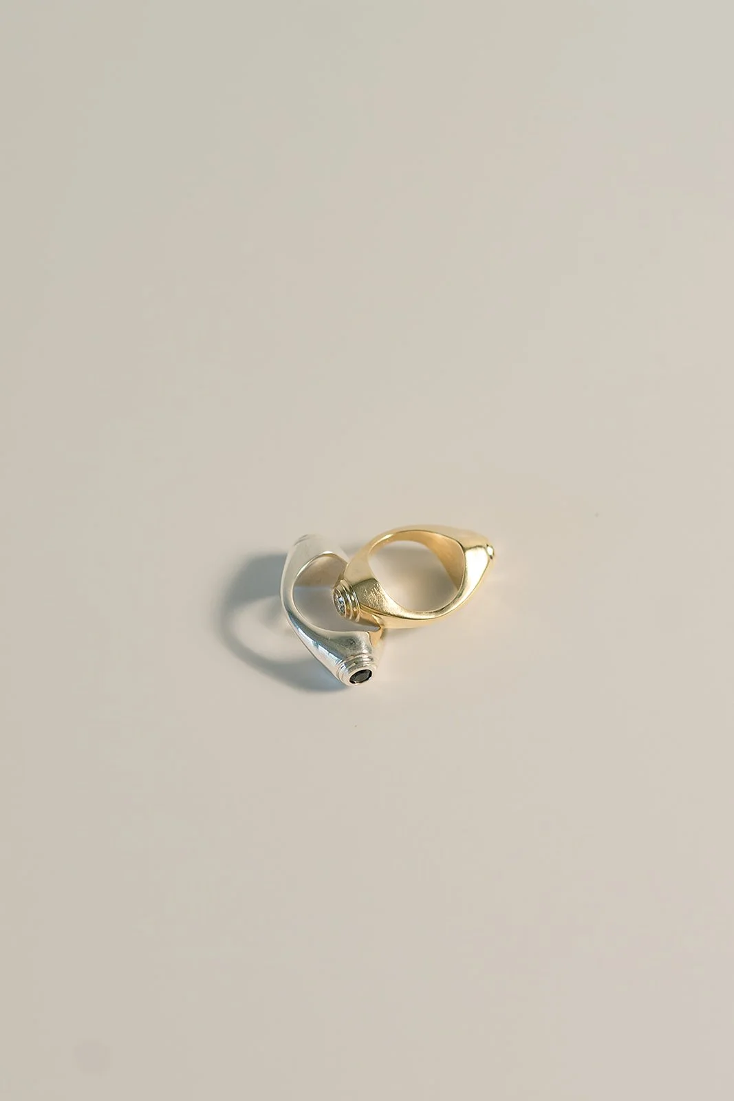 PEAK rings 925 and 10k overlap birds eye 1.jpg