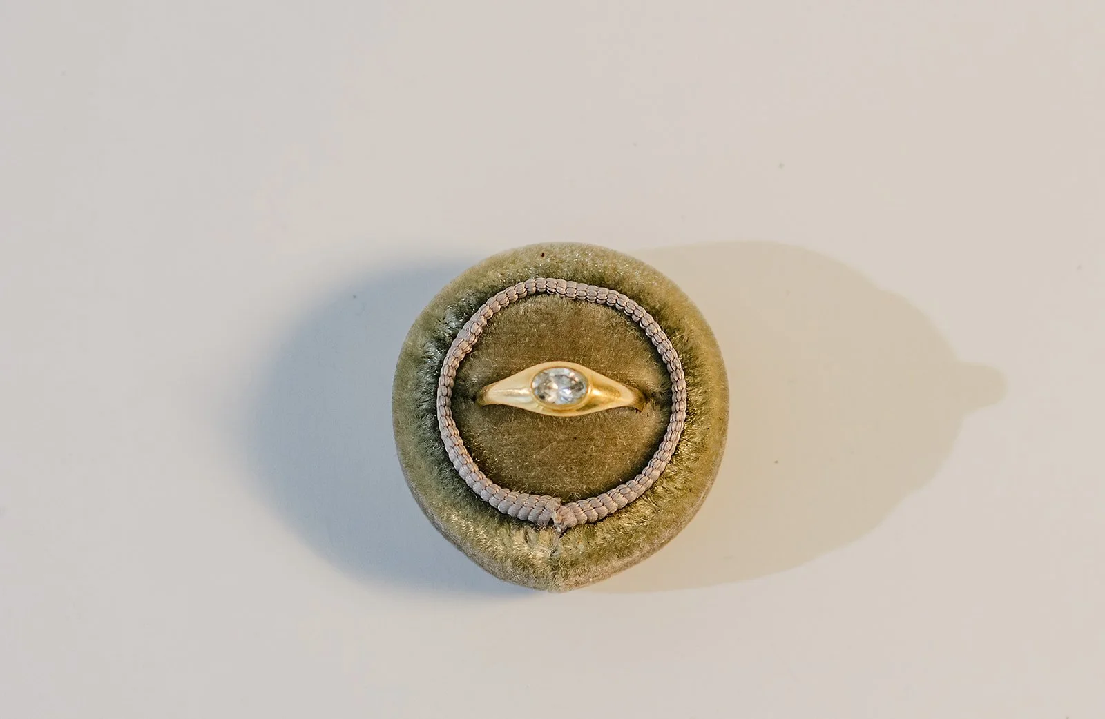 baby oval ring in box fron facing 1 .jpg