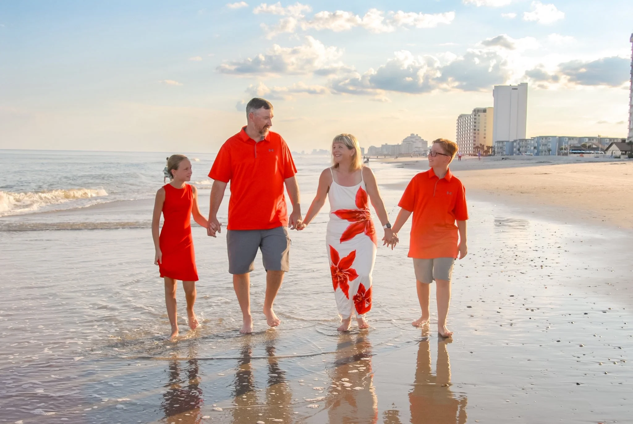 Family beach photos in Myrtle Beach SC at sunset by Faith K Photography