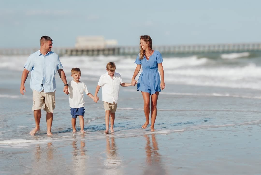 Myrtle Beach family photographer capturing candid moments on the beach