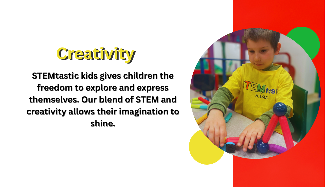 A young boy wearing a yellow TEmtast Kids shirt playing with colorful magnetic building toys at a table in a classroom or play area.