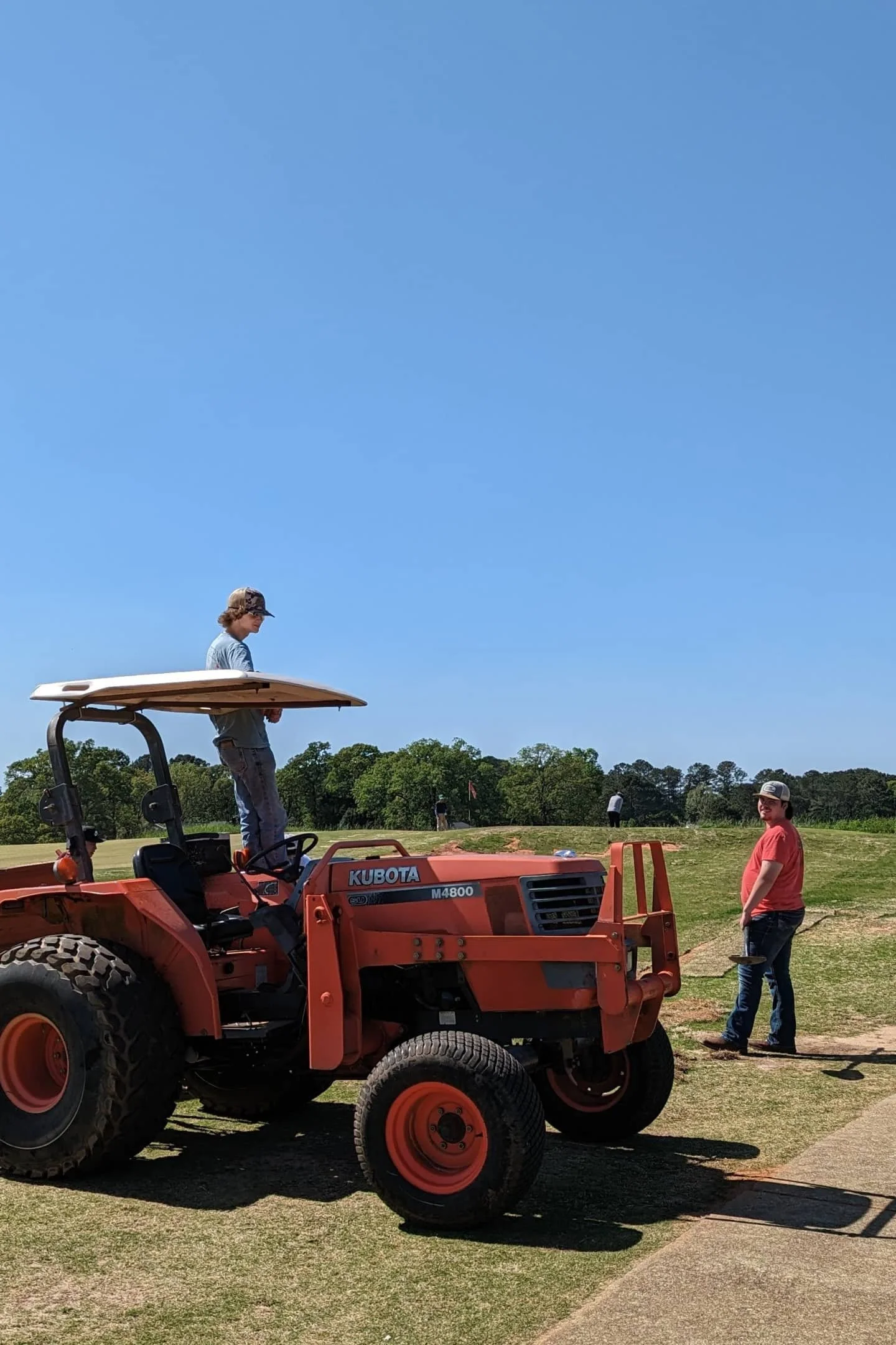 The Fields | Sodding features with the maintenance crew