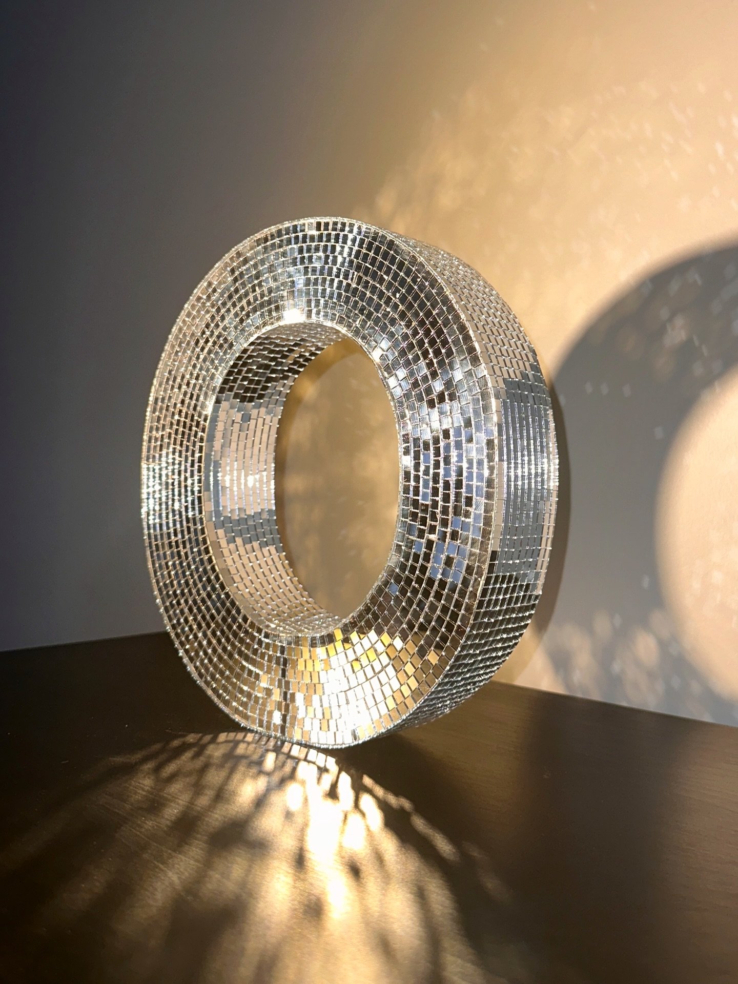 Long before the glitz of the 1970s, the first &ldquo;mirror ball&rdquo; was patented in 1897 as the Myriad Reflector. It wasn&rsquo;t born in a nightclub, but in a Massachusetts dance hall to turn a single light source into a thousand dancing stars. 