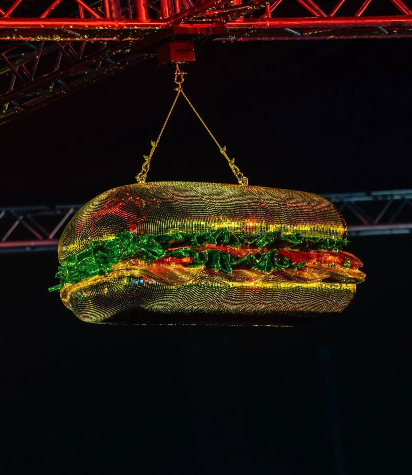 A statement in motion🔥

Unveiled at Breakaway Festival, our suspended Disco Sandwich is a bespoke reflective installation designed to transform light into atmosphere.

Hand-applied real glass mirror tiles create a surface that captures every flicker