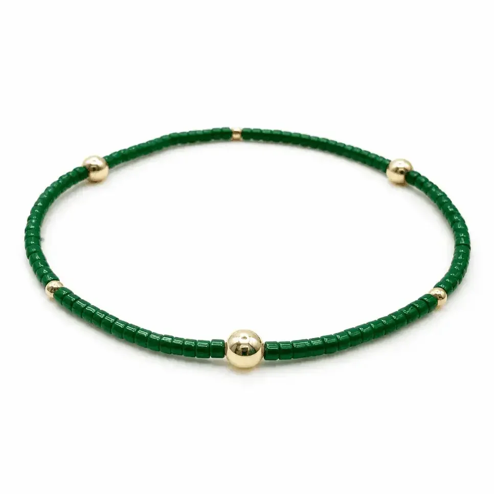 green bracelet.webp