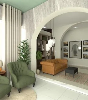 Living room with green armchair, orange couch, gray ottoman, white curtains, potted plant, and wall decorations.