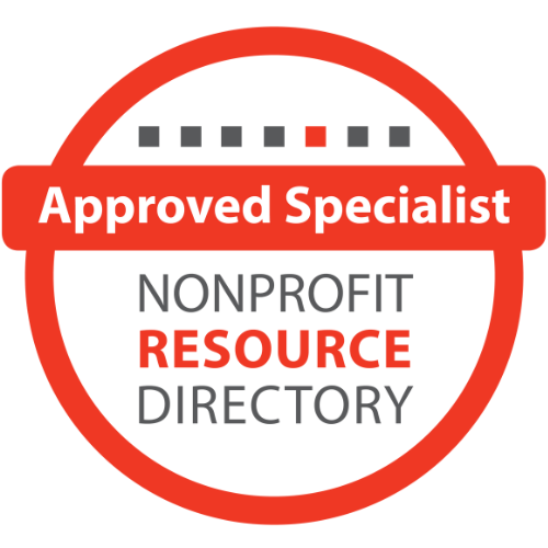 A circular badge with a red border and a white background, featuring the text "Approved Specialist" in bold white letters on a red banner across the middle, and "NONPROFIT RESOURCE DIRECTORY" in black and red text underneath.
