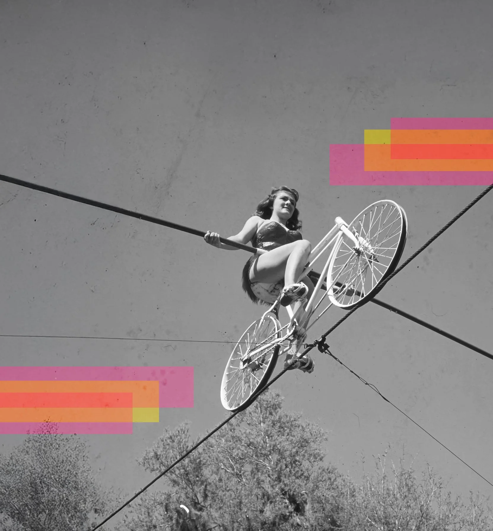 Women on bike on tight rope