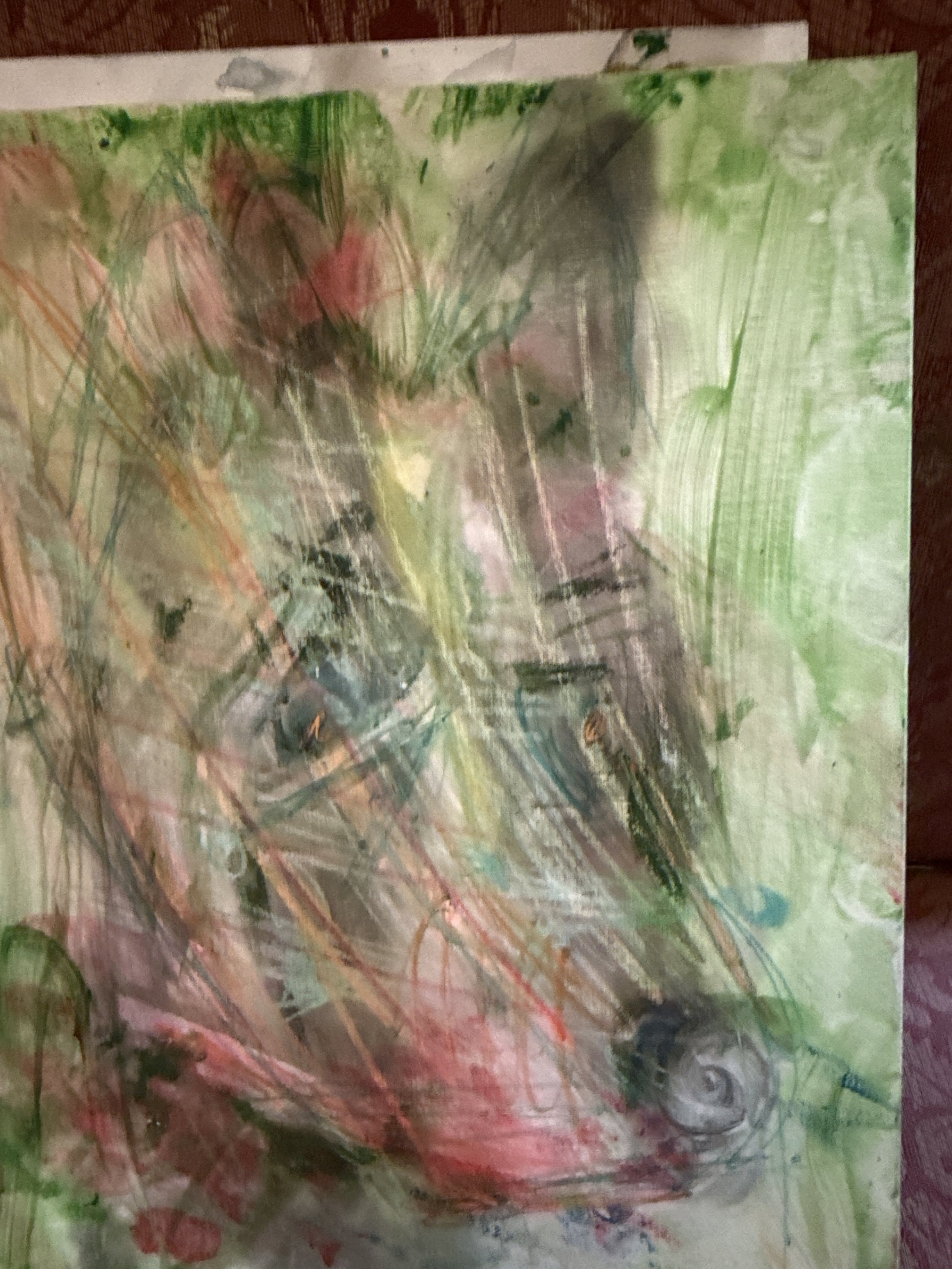 Abstract watercolor painting with green, pink, black, and blue strokes and splashes.