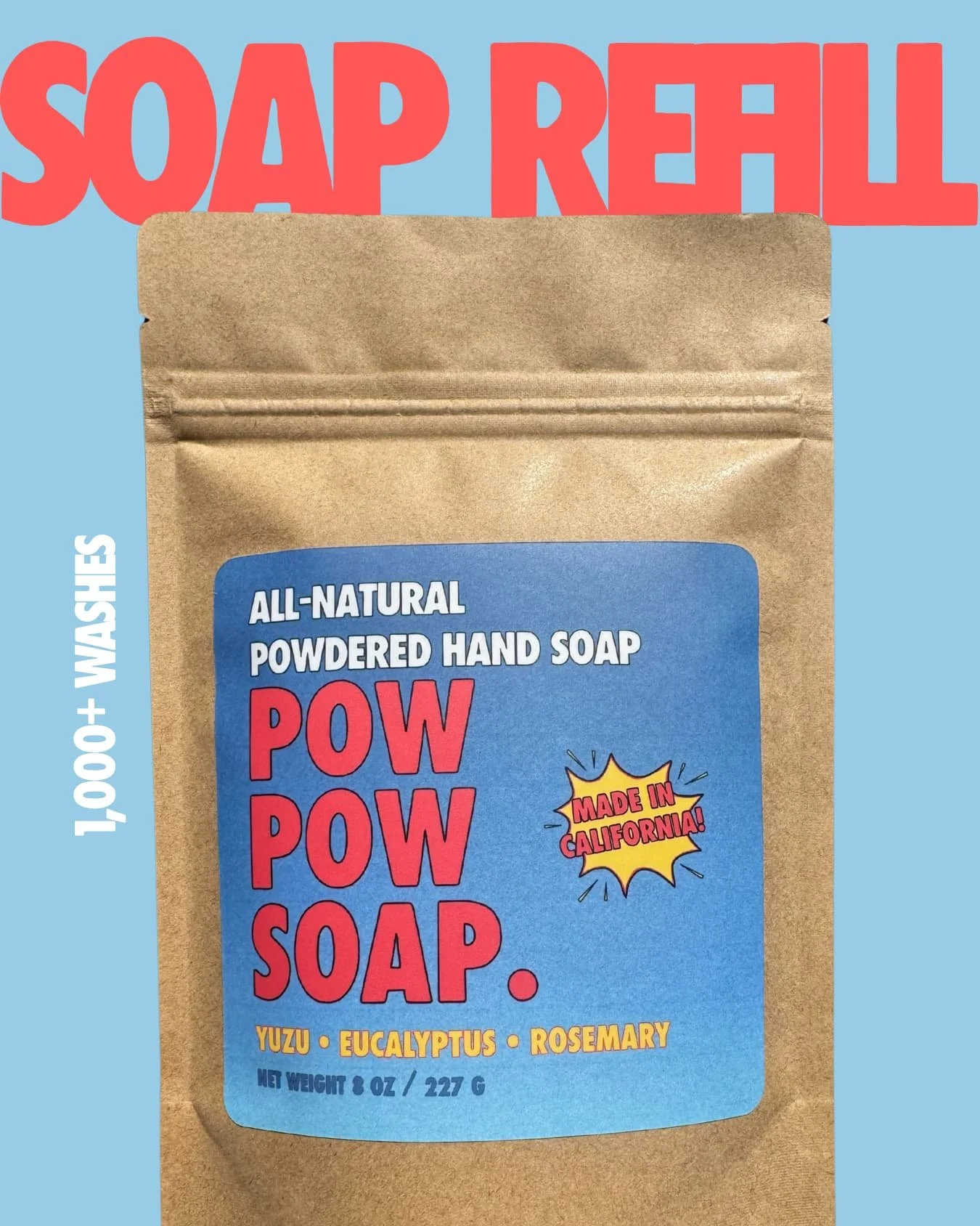 A brown paper bag of all-natural powdered hand soap called Powa Powa Soap, with a blue label indicating it is made in California and contains yuzu, eucalyptus, and rosemary. The background features large red text that reads "Soap Refill" and a vertical white text on the left side that says "1,000+ washes."