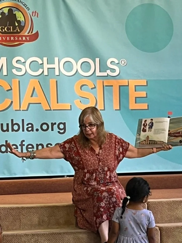 Reading to a large group of children