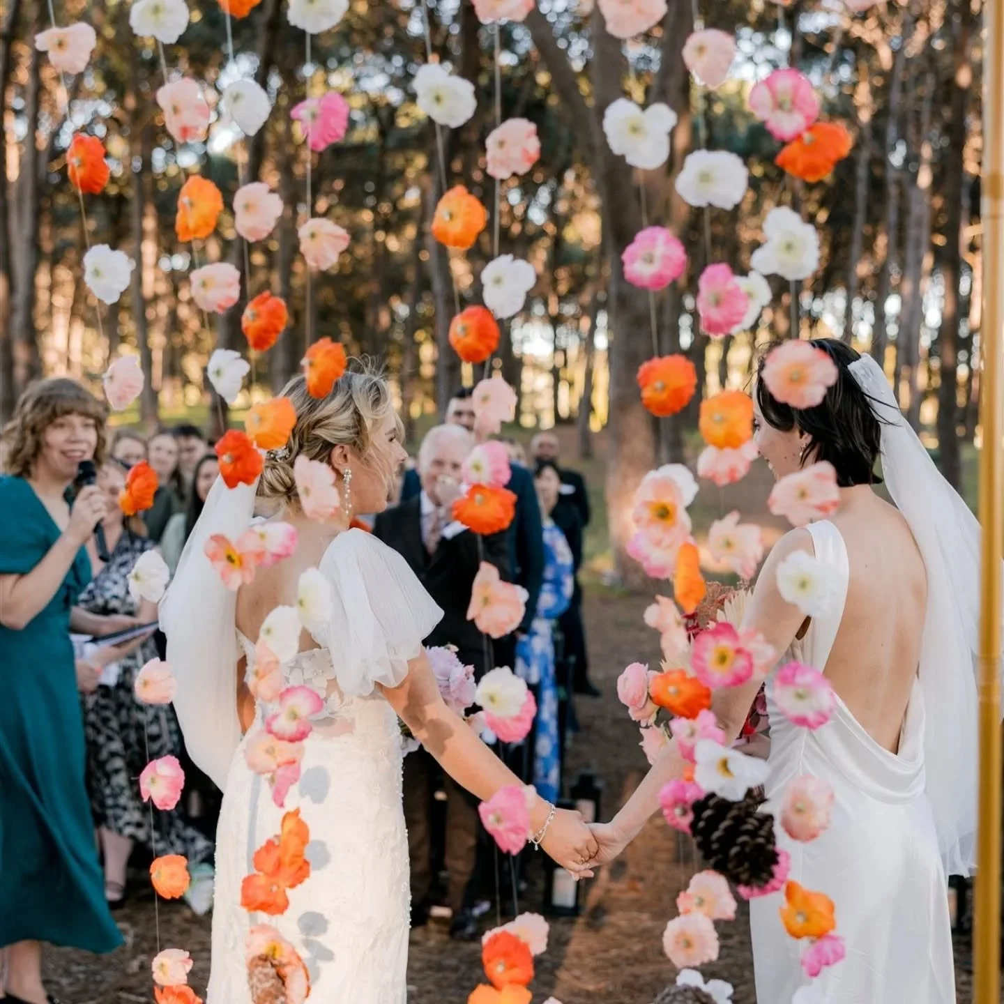 Some ceremonies are beautiful, some are emotional - and some, like Isabella &amp; Olivia&rsquo;s, are pure joy. From a full group sing-a-long to Elton John's &quot;Are You Ready for Love&quot;, to their super sweet, cross continental love story, thei