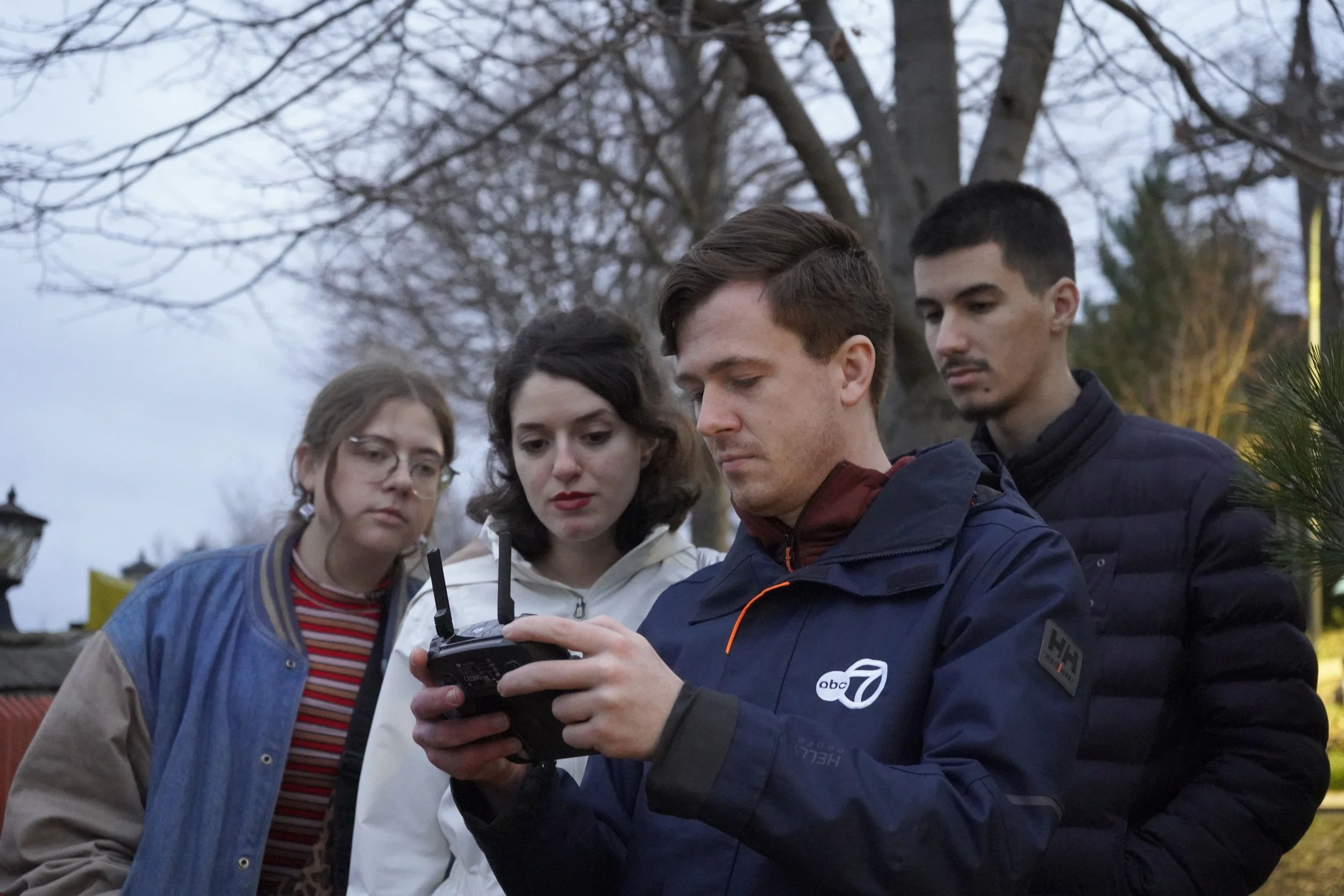 The team flies a drone in Tirana, Albania