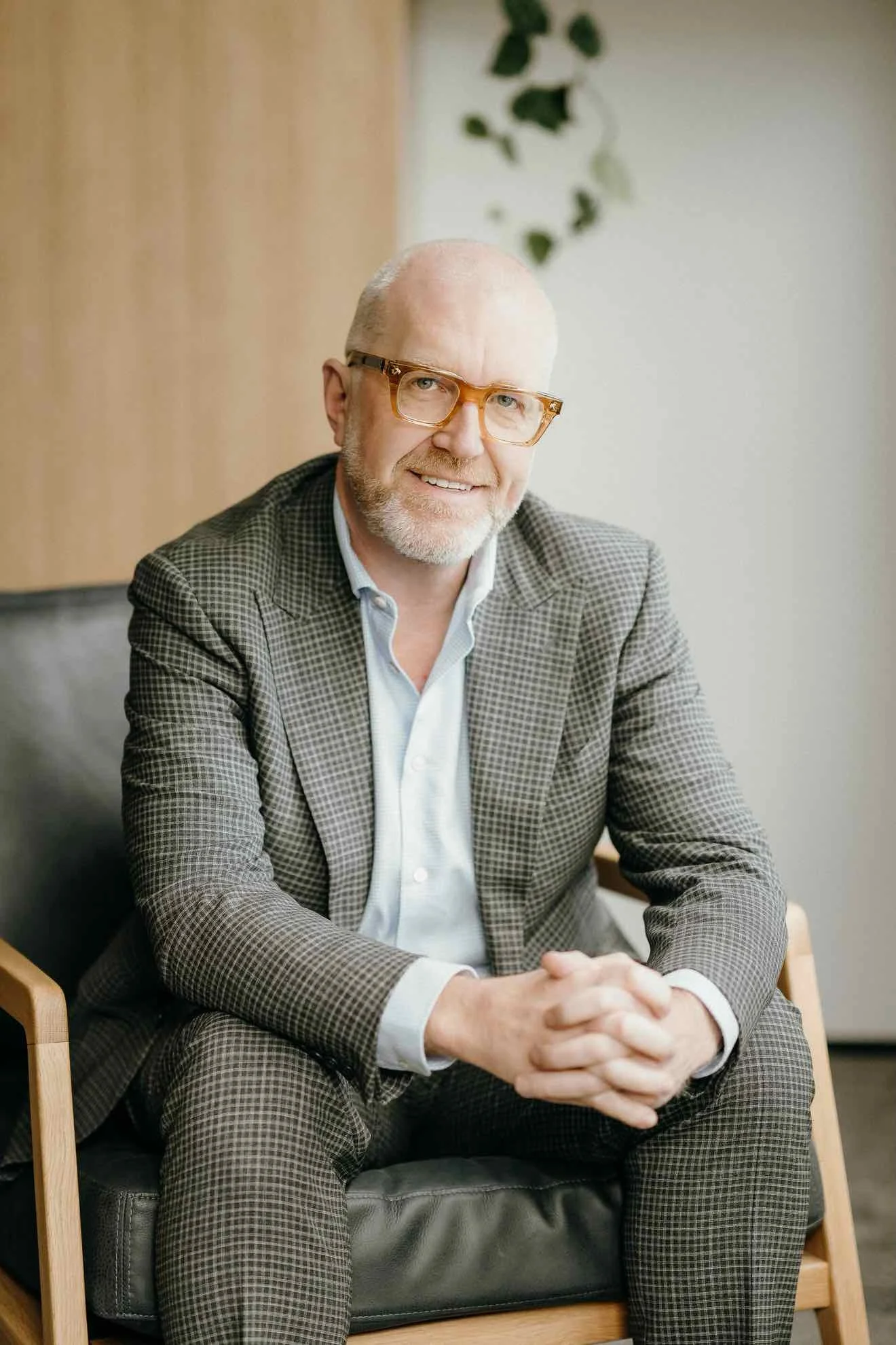 Dr Michael Wynn-Williams, Auckland gynaecologist and laparoscopic surgeon, seated in consultation room