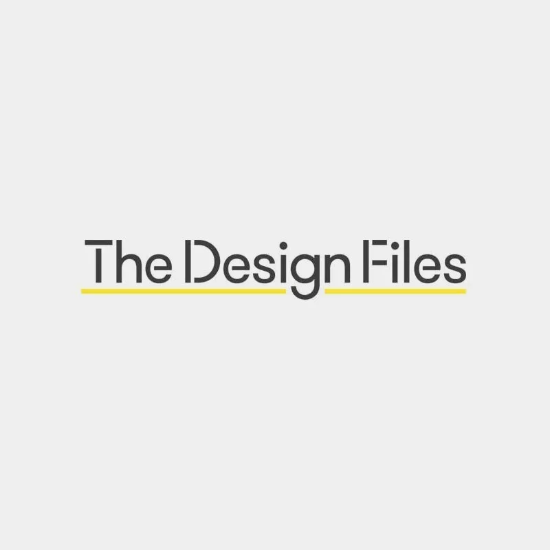 Text reading 'The Design Files' with a yellow underline on a light gray background.