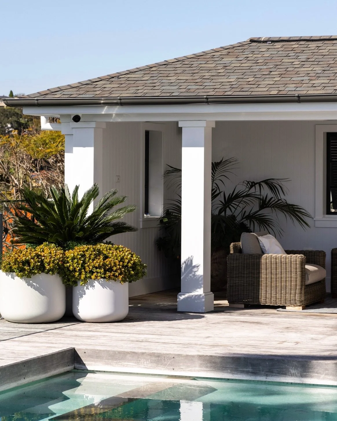 A poolside cabana designed as a cool retreat from the summer sun. Thoughtfully considered proportions and materials come together to create a calm, inviting extension of the home&rsquo;s outdoor living space. Project @strittdesignandconstruction. Pho