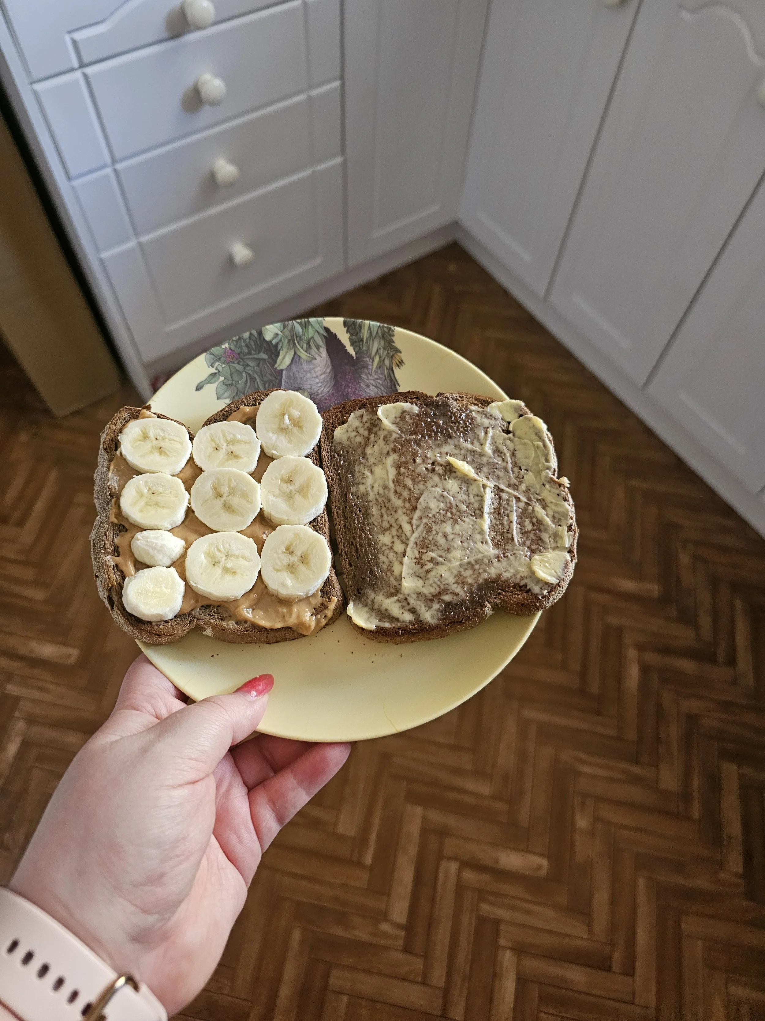2 pieces of toast, 1 with butter and 1 with peanut butter and banana, an example of a low-spoon meal.