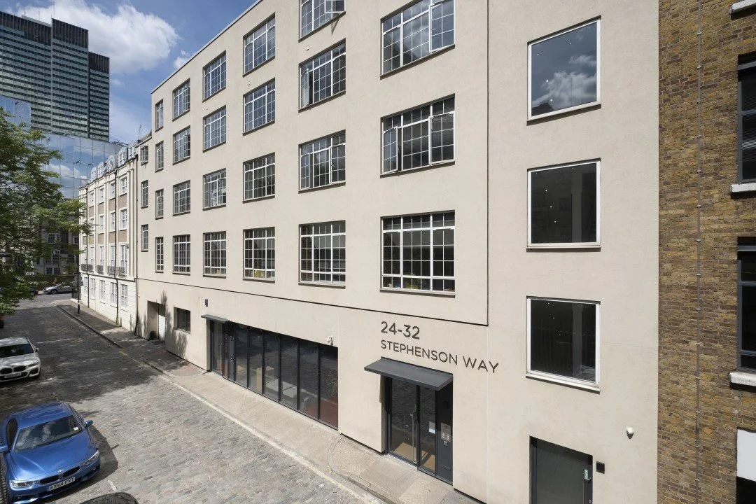 a photo of the stephenson works building in central london.
