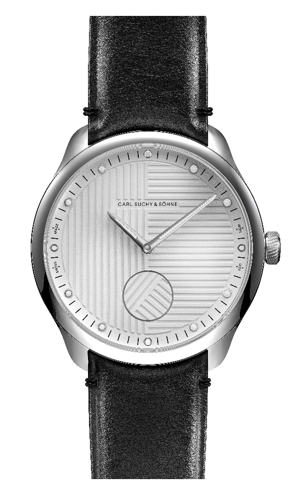 Close-up of a Carl Suchy & Söhne wristwatch with a silver face, black leather strap, and minimalist design showing time at 2:10.
