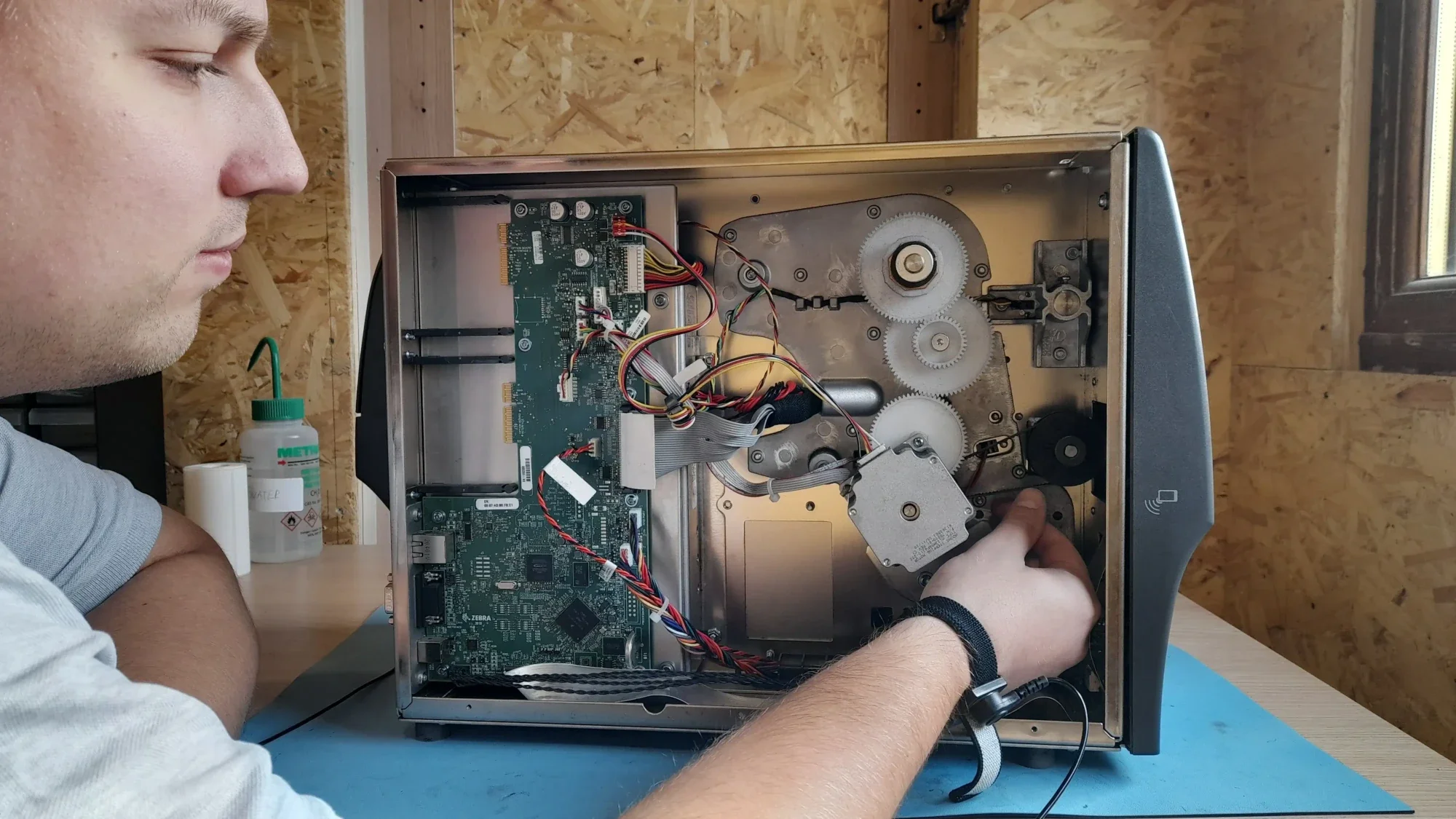 Label printer repair engineer servicing barcode printer in the UK