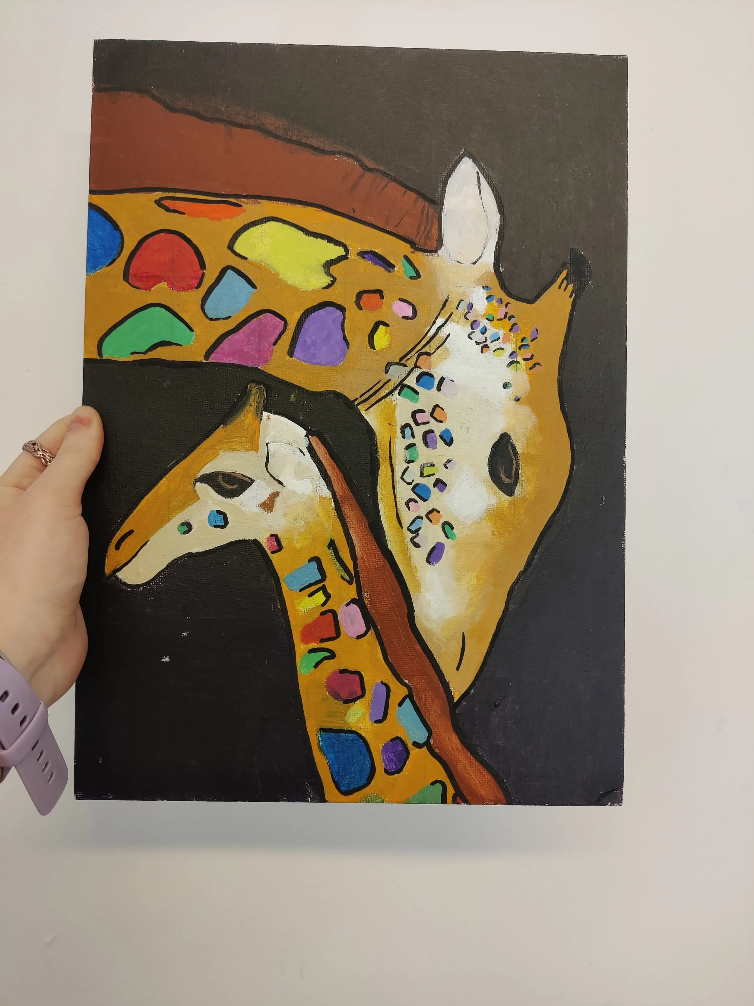 Colorful painting of a giraffe with a patterned mane and neck, depicted in an abstract style with multicolored shapes and bold black outlines.